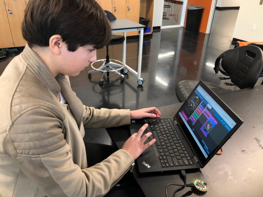 Ninth grader Graciela  Whitaker-Castaneda
practices her block coding skills during hour of code. 