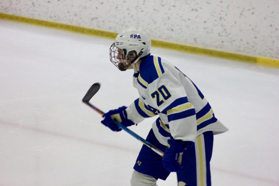 Junior Jake Hosszu plays derfense against Minnehaha. 