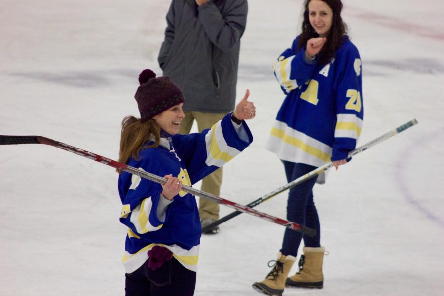 US Science teacher Christine Schwichtenberg applauds the announcer for pronouncing her name correctly.