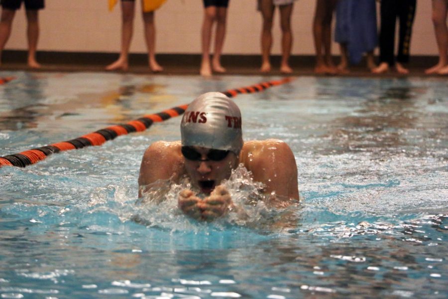 Junior Cesar Gallagher swims the 200 IM. 