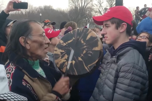 Confrontation between Nick Sandmann and Nathan Phillips.