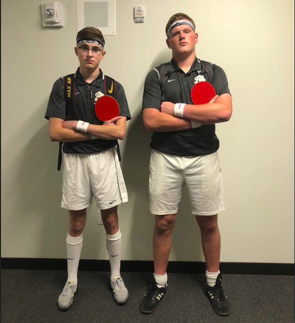 Senior Ryan Moore and senior Shane Litman dress as ping pong players for twin day.