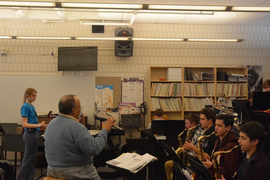 Director+of+Band+Bill+Mayson+conducts+a+group+of+students+in+the+jazz+band.