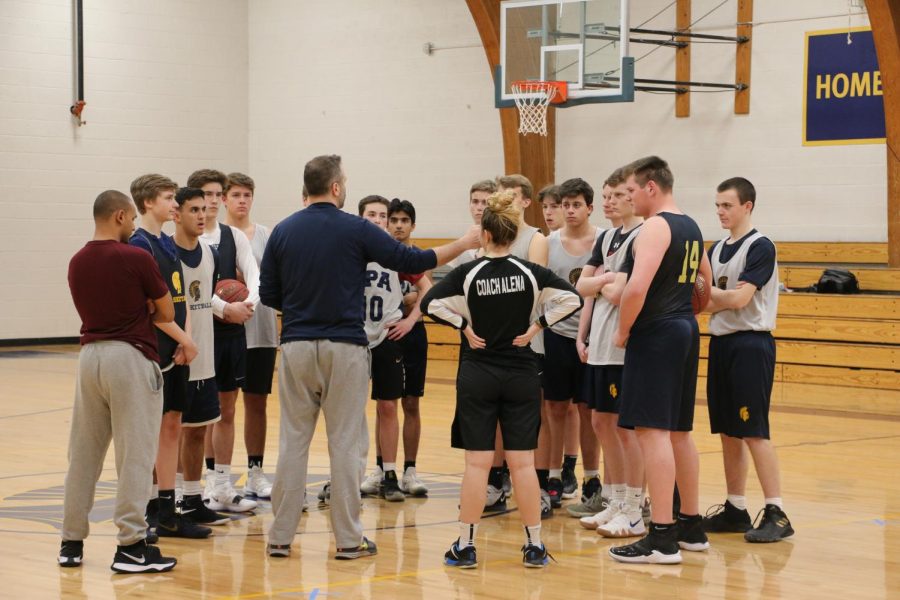 The team huddles up after a drill.