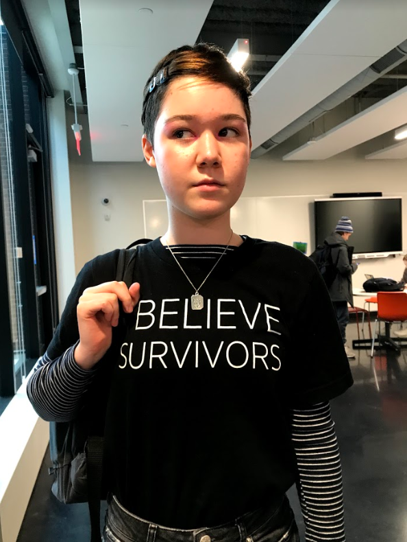 Sophomore Isobel Alm makes a statement with her shirt; "I Believe Survivors," made by HerSpace back in November.