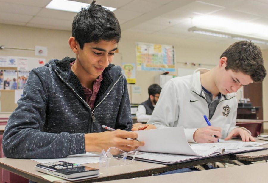 Juniors Nathan Sobotka and Sameer Bijwadia doing the analysis portion of the thermodynamics competition.