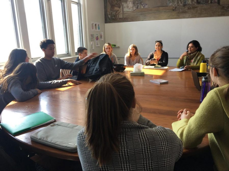 Students gather at a meeting for the India trip.