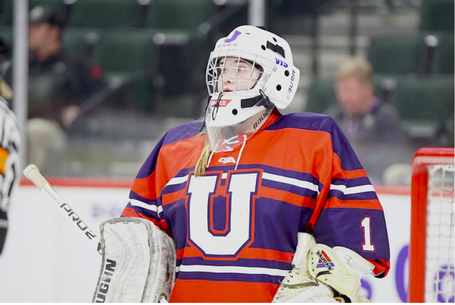 Geise stands in net during the quarterfinal round of the 2019 state tournament at the Xcel Energy Center. 