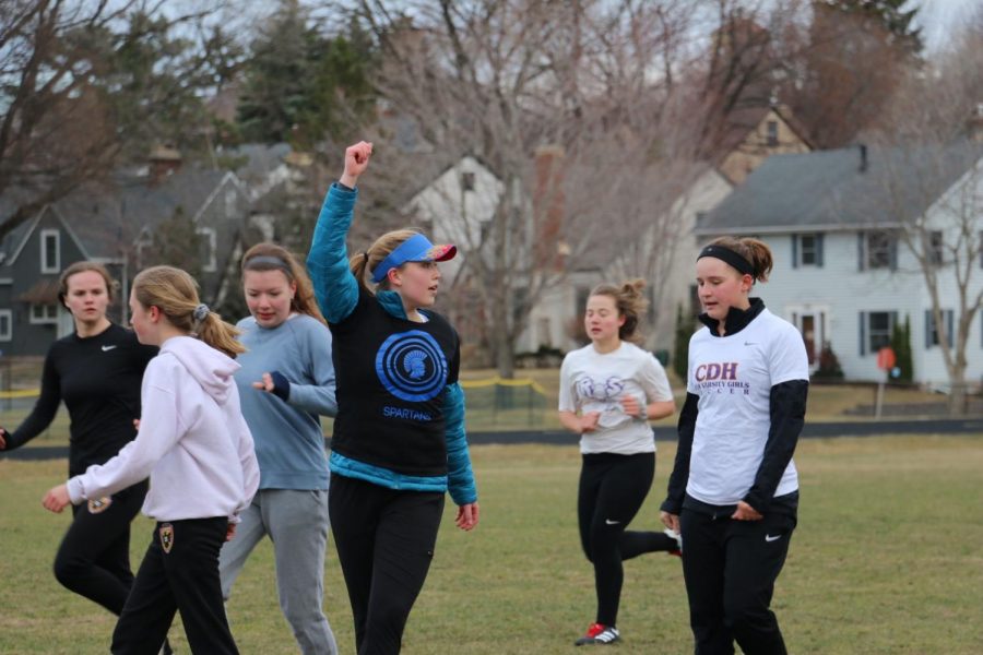 Junior Sydney Therien calls out to her teammates to set up an offensive play. 