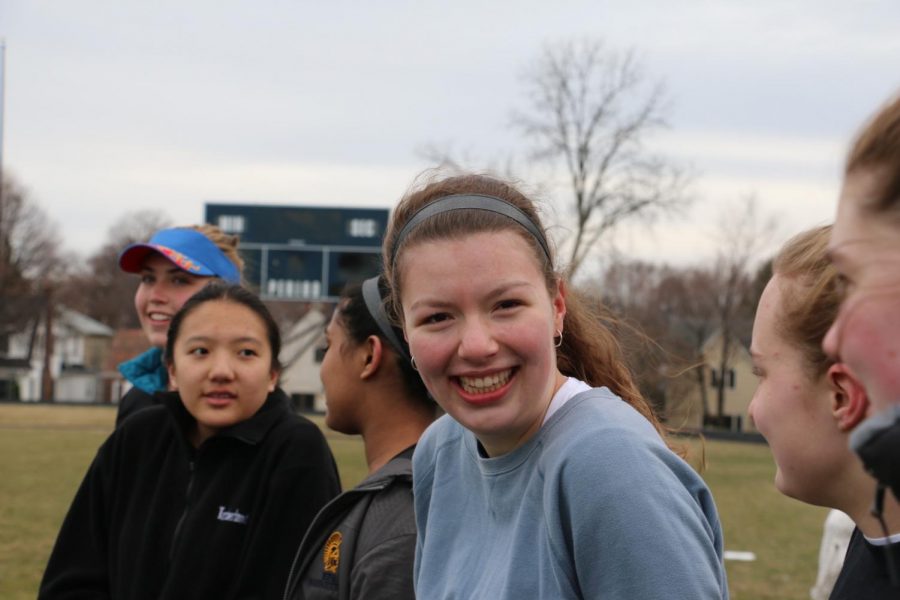 Sophomore Pilar Saavedra-Weis cheers on her teammates. 