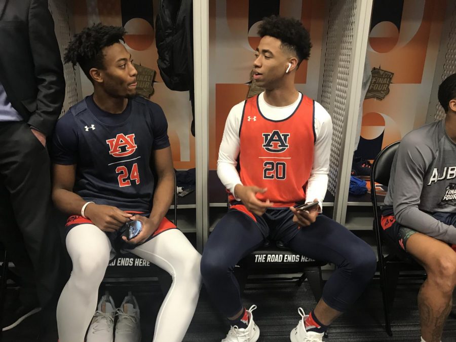 Auburn+players+talk+during+a+Final+Four+press+conference+during+the+2019+March+Madness.