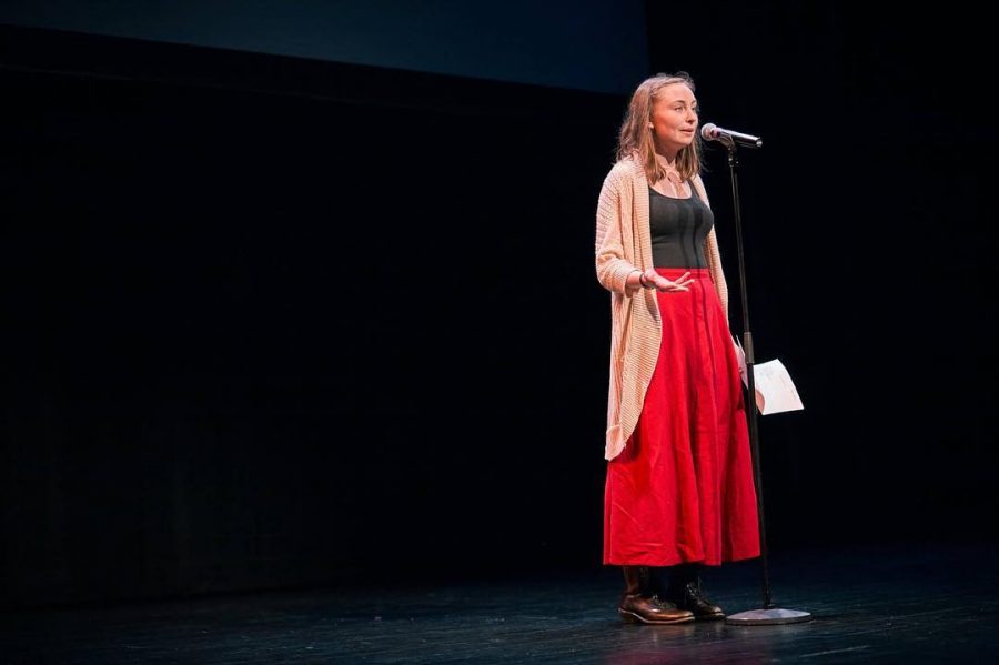 Junior Anna Snider performs at a poetry slam. The main reason I write poetry is for that healing element. The main reason I do slam is as an empowering thing, she said.