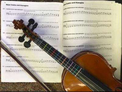 Chen's violin overlaps her music.