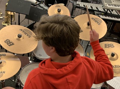 Jake Therian plays percussion in Jazz Band. He said it isn't hard to learn to play the drums: