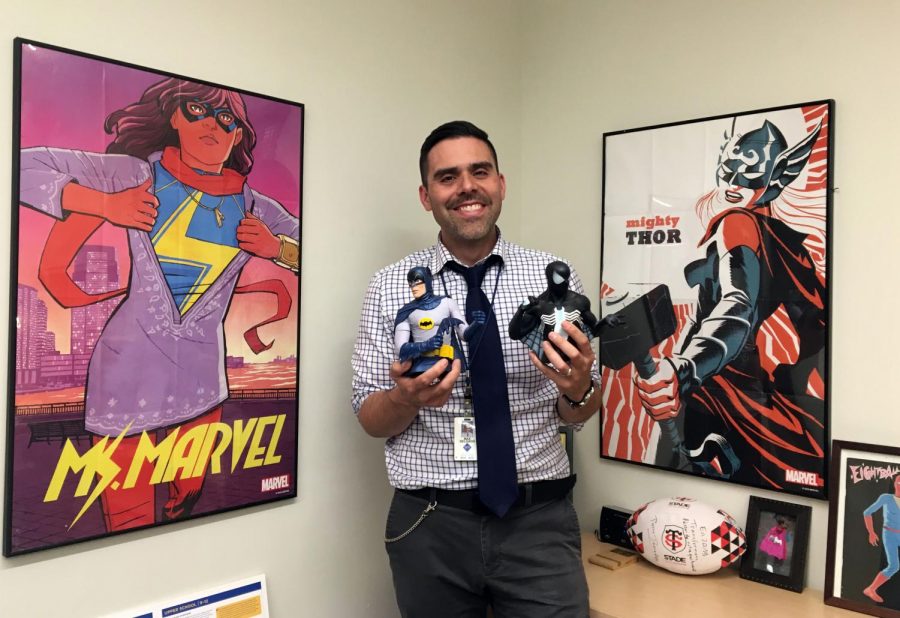 Upper school principal Max Delgado has decorated his office to match his passion for comic books.