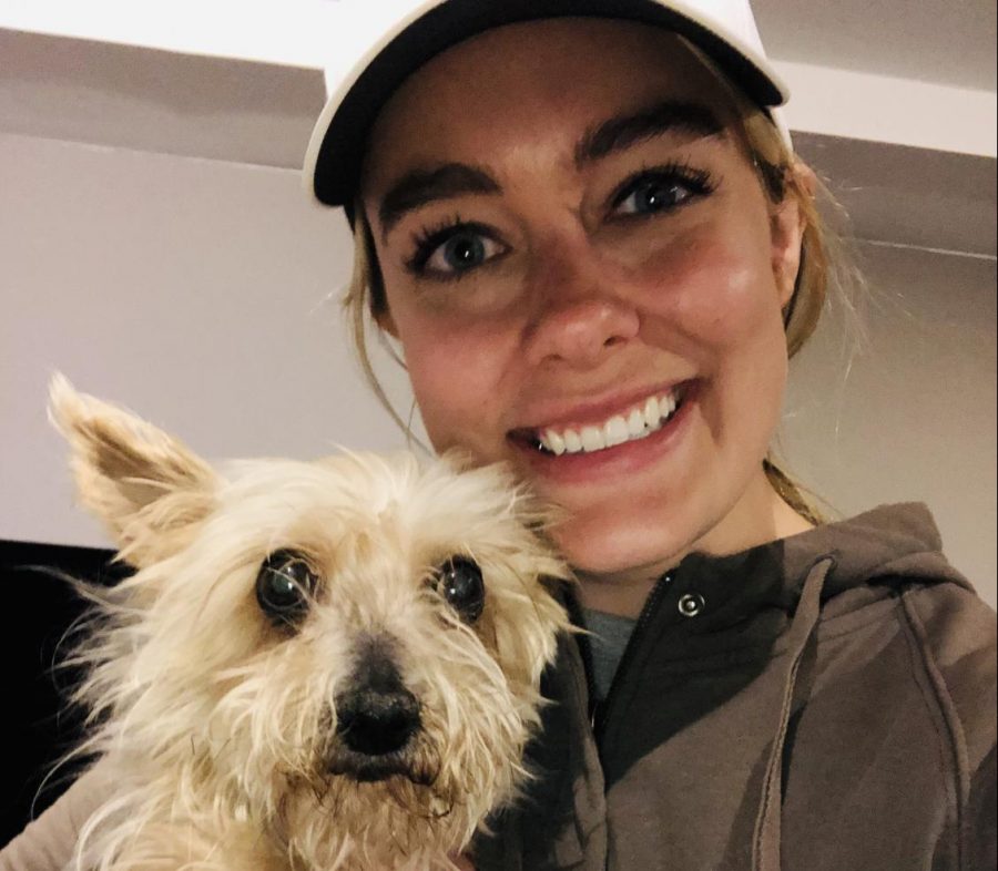 US History teacher Olivia Rodriguez with her dog, Lily.