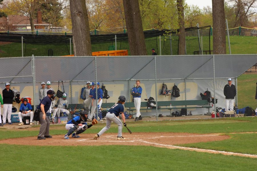 Ninth grader Judah Thomas steps up to bat. 