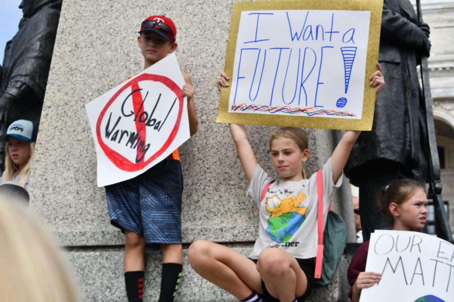 Protesters gathered at the State Capitol to advocate for more environmental policies.