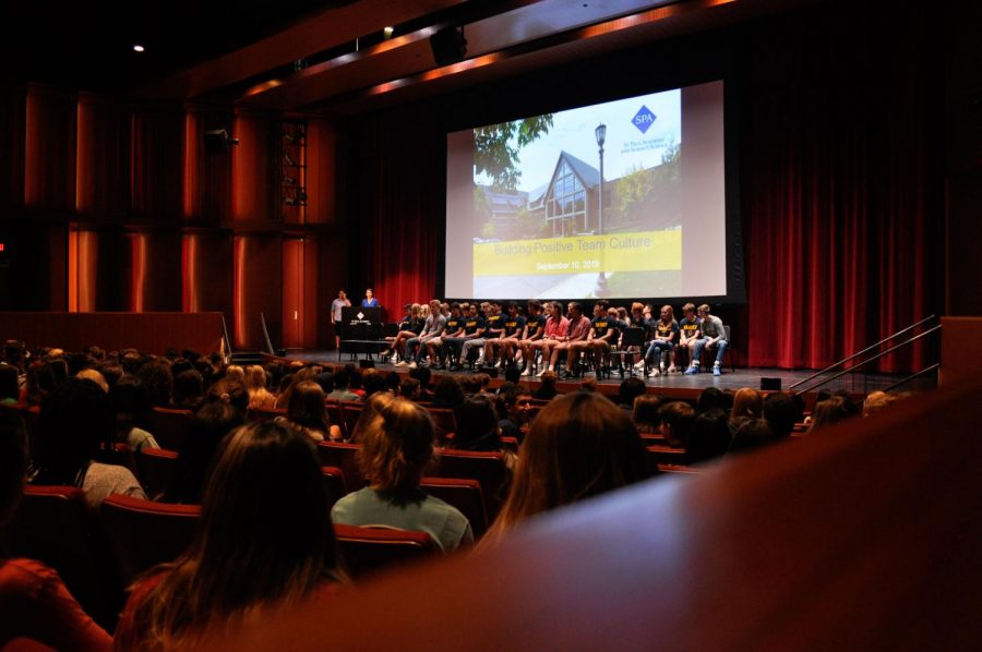 Team captains sit on the Huss stage Sept. 10, facing student athletes who will play on SPA teams this year. Director of Athletics Dawn Wickstrum said, “I think it was really powerful to have our captains up on the front of the stage, in front of all of their peers.