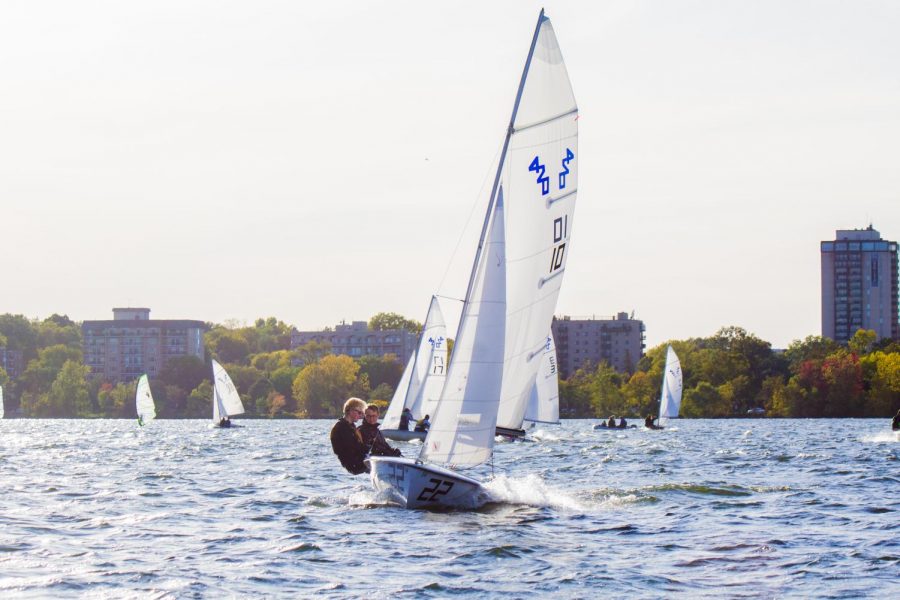 Juniors TJ Isberg and Phineas Tait sail through the waters of Bde Maka Ska.
