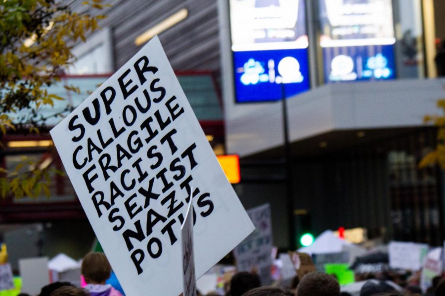 Supporters follow Trump inside as protesters surround Target Center