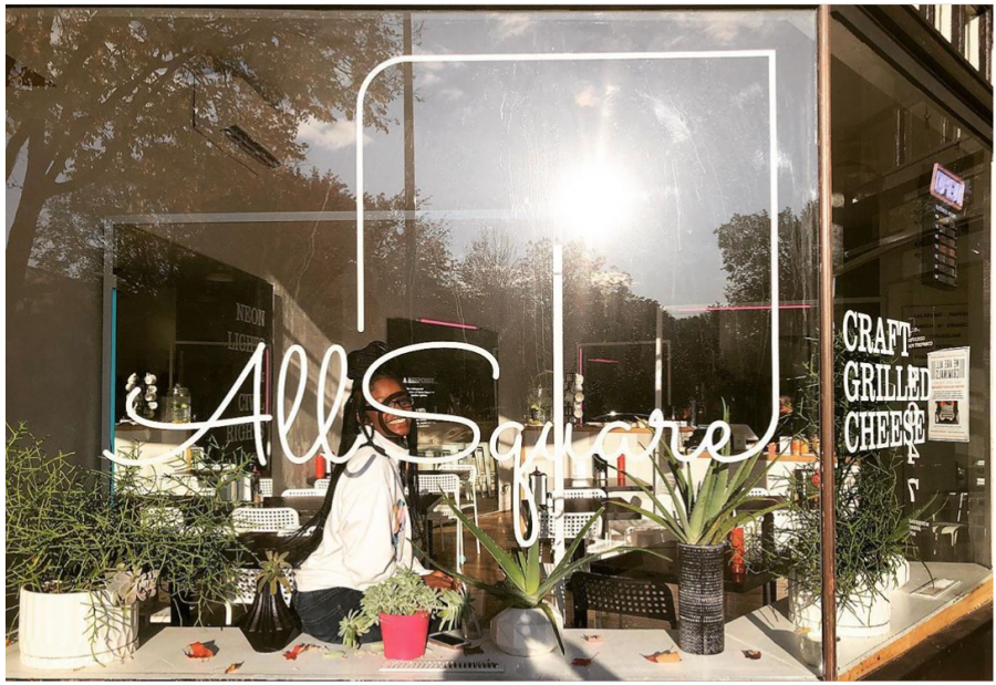 The storefront of All Square on Hiawatha Avenue where Mia Hofmann spent for summer is warm and inviting.