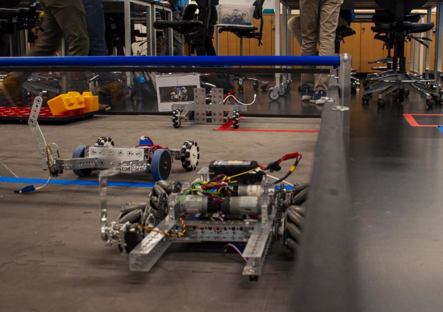 The robotics team showed off their robots during the open house and talked to potential students about SPA's computer programming and engineering classes.