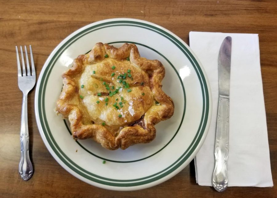 The Hot Hands chicken pot pie features a flaky pastry crust with a chicken stew filling.
