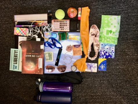 Junior Gabriella Thompson's backpack carries school supplies, snacks, and random things that are handy to have when bored.