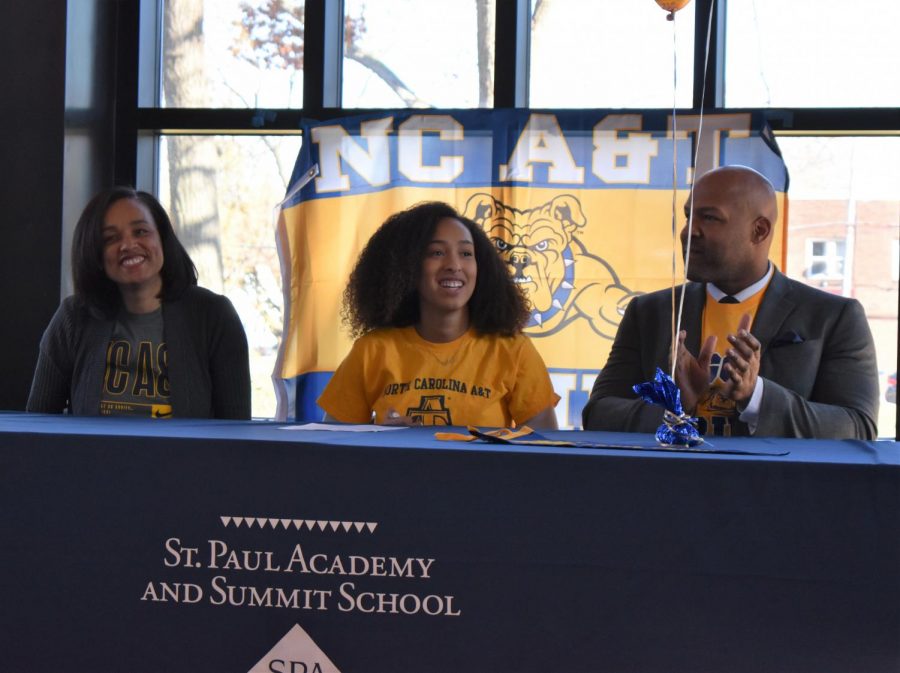 Senior Arie Walker signed to solidify her commitment to play volleyball for North Carolina A&T State University on Thursday. I was a little nervous, not gonna lie but being next to my parents helped me a lot. I wasnt too worried about the number of people because I knew they were all there to support me, Walker said. 
