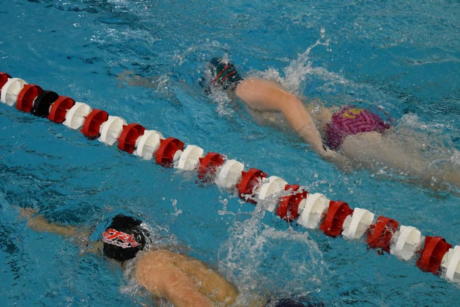 Swimmers warm-up before the meet. 