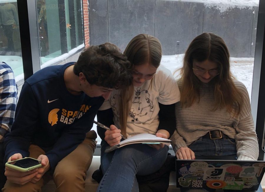 Juniors Noah Lindeman, Sara Browne and Grace Tilney-Kaemer study for an exam together. 