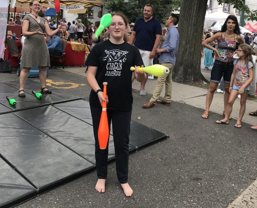 9th grader Leona Barocas juggles at a competition. Juggling and circus have taught me a lot about patience because learning juggling skills takes a lot of time and involves a lot of mistakes, Barocas said.