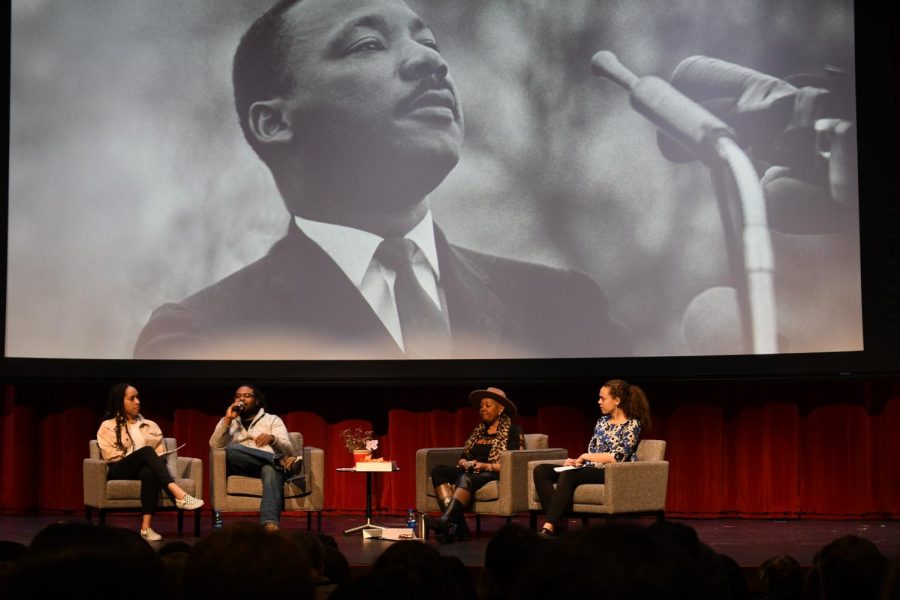 Speakers Rose McGee and Anthony Galloway answer questions posed by junior Gabriella Thompson and senior Arie Walker for the MLK assembly.  