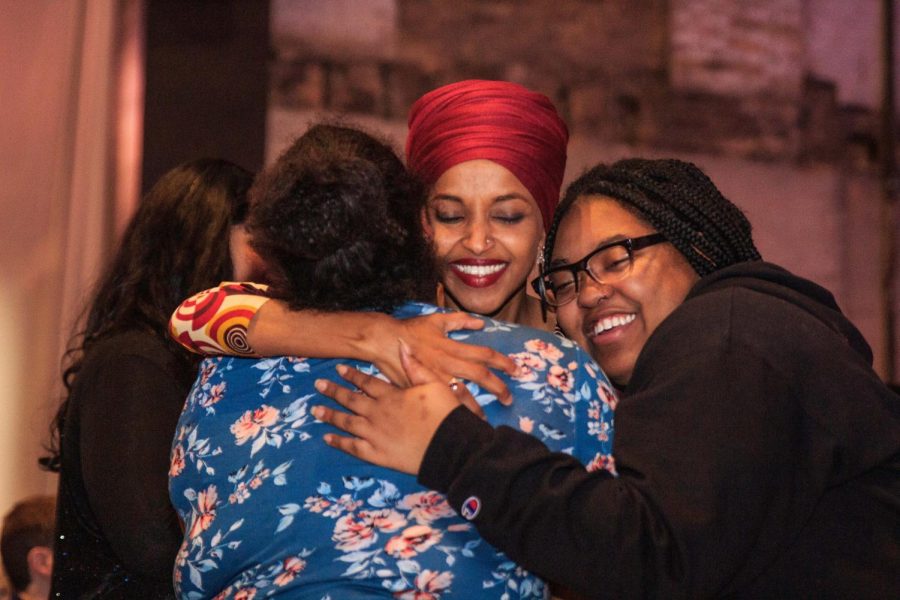 Congresswoman Ilhan Omar (D-MN) embraces supporters at her reelection campaign kickoff event before taking the stage Jan. 23.