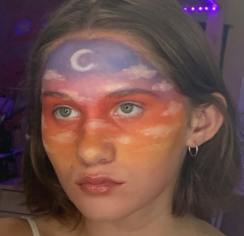 HEAD IN THE CLOUDS. Sophomore Maggie Baxter uses her face as a canvas for unique makeup designs. Ive been drawing, painting, and making art since I could hold a pencil or paintbrush, she said.