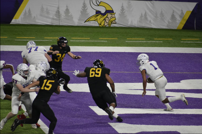 Wolfpack Captain Jalen Suggs runs through the defense during the teams state semi-final game.