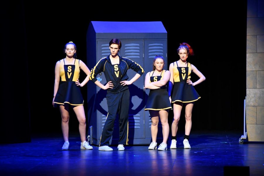 Cheerleaders Grace Krasny, Gavin Kimmel, Evelyn Lillemoe, and Tyler Christensen defend their school against the aliens in Aliens vs. Cheerleaders.