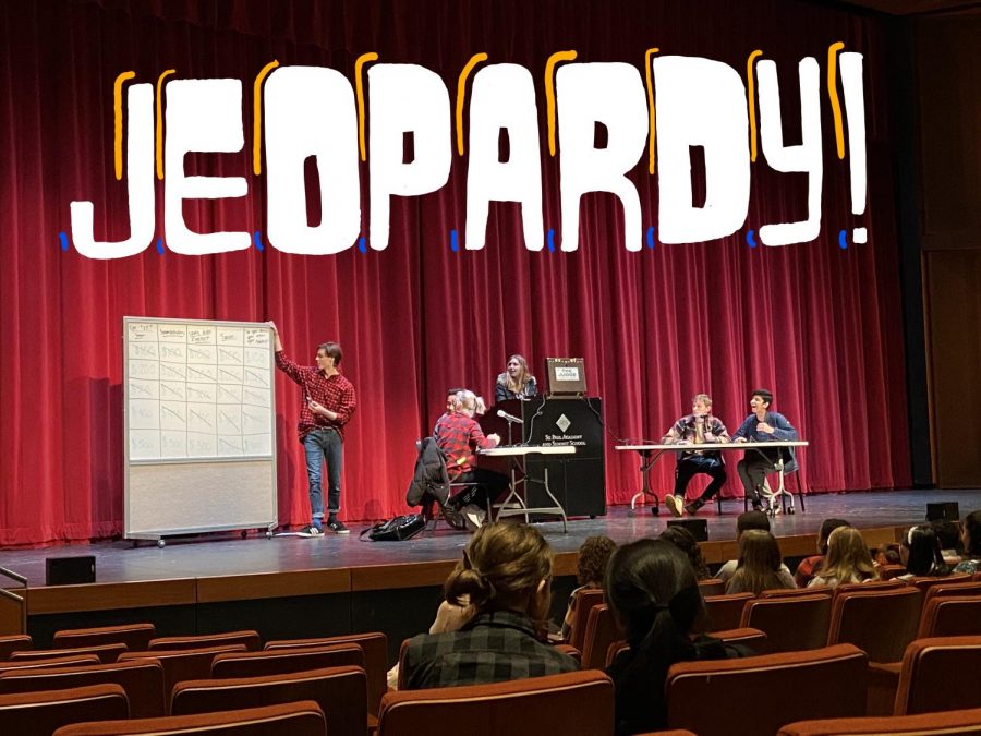 The judges, senior Sydney Therien and junior Gavin Kimmel and contestants, Ninth grader Tenzin Bawa, sophomore Ellie Dawson-Moore, junior Noel Abraham, and senior Henrik Schleisman laugh hysterically at an answer to one of the jeopardy questions.