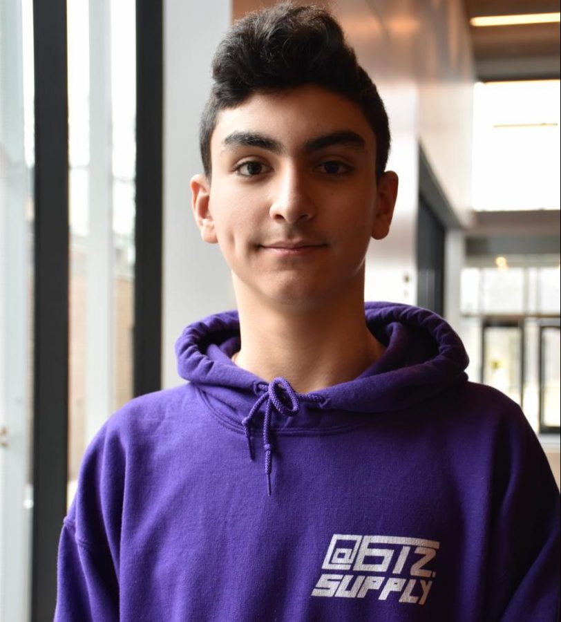 Abdulkarim pictured with a sweatshirt from his sneaker business, 612 Supply. 