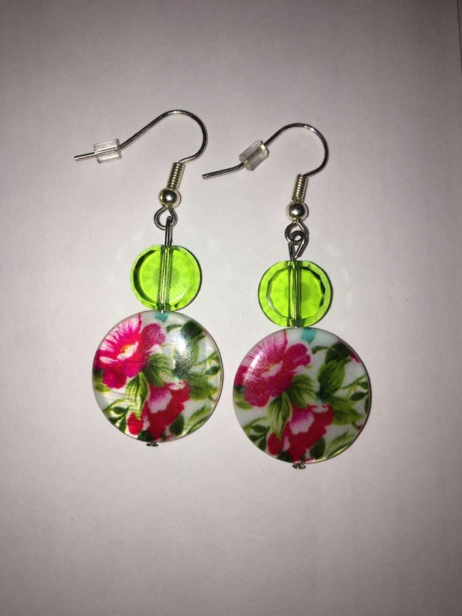 Junior Ruby Hoeschen made this pair of earrings with beads and other materials from Michaels.