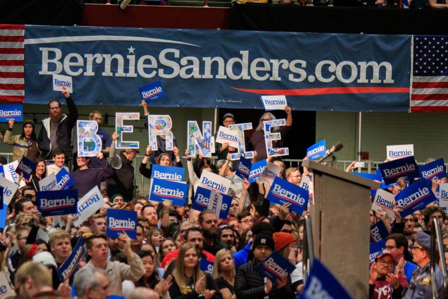 Sanders supporters hold up signs spelling out the Vermont senators name at his rally at Roy Wilkins Auditorium on March 2, 2020.