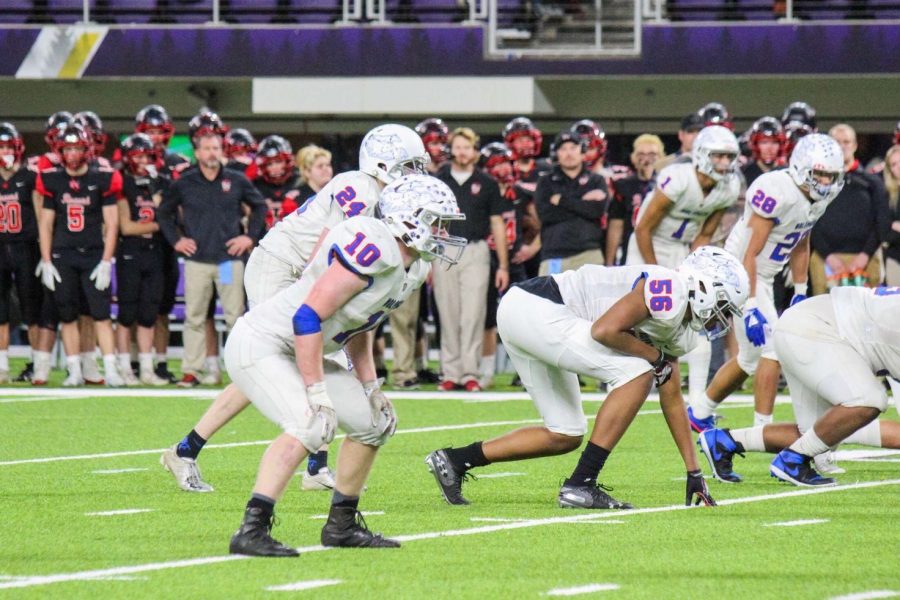 Tommy Stoplestad lines up for a snap during an SMB Wolfpack Football game