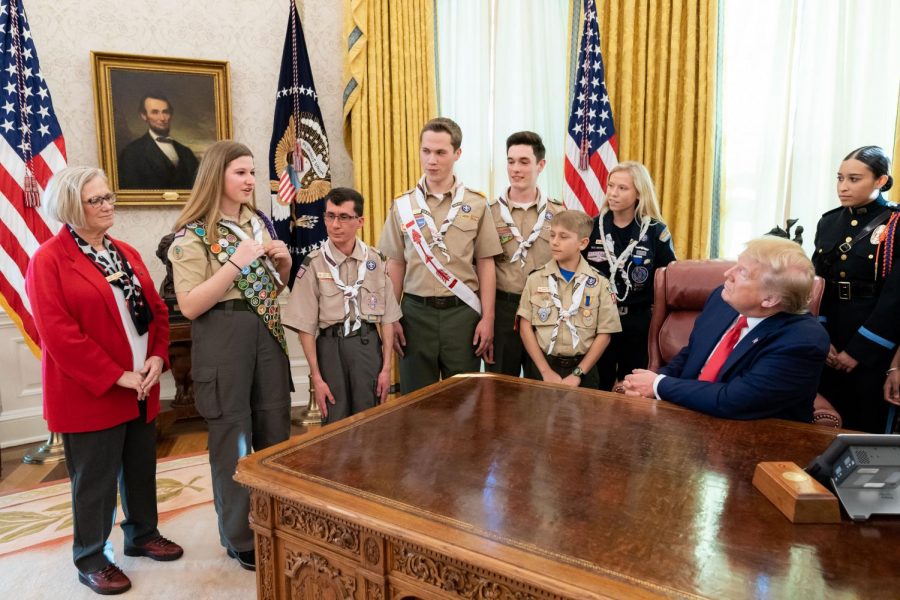 Tunney represents Boy Scouts of America in a meeting at the Oval Office. 