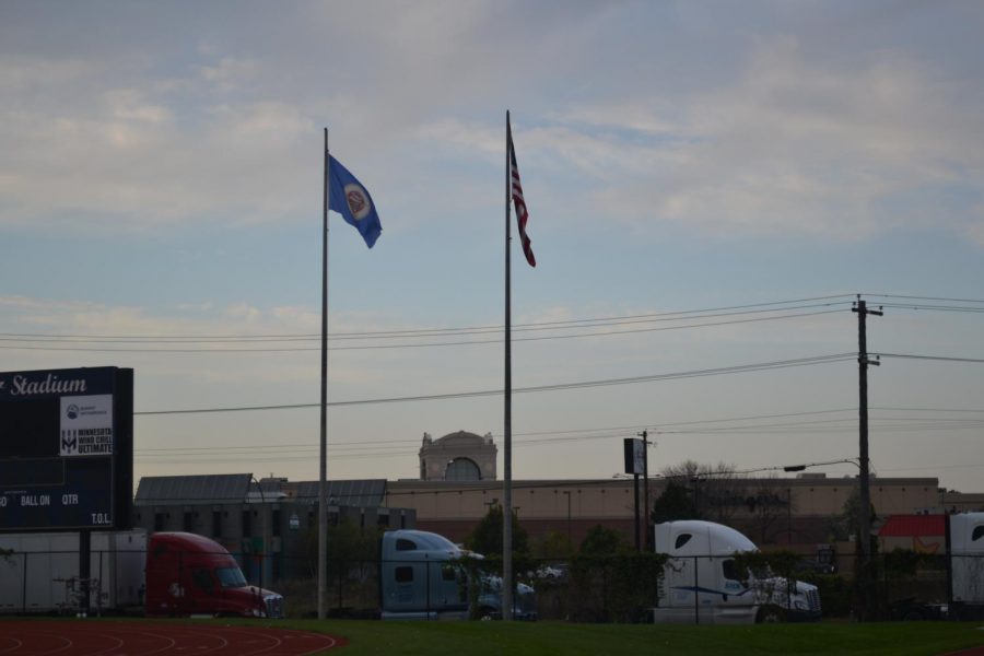 The Minnesota and United States flags fly over Sea Foam Stadium at Concordia University. SPA does not fly a Minnesota flag on its flagpole. 