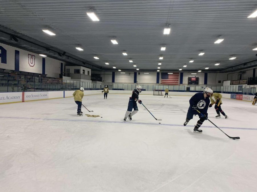 Seniors Michael Bagnoli, Evan Thissen, Frank Tsiouvaras, and Bobby Verhey participate in a drill while wearing masks.