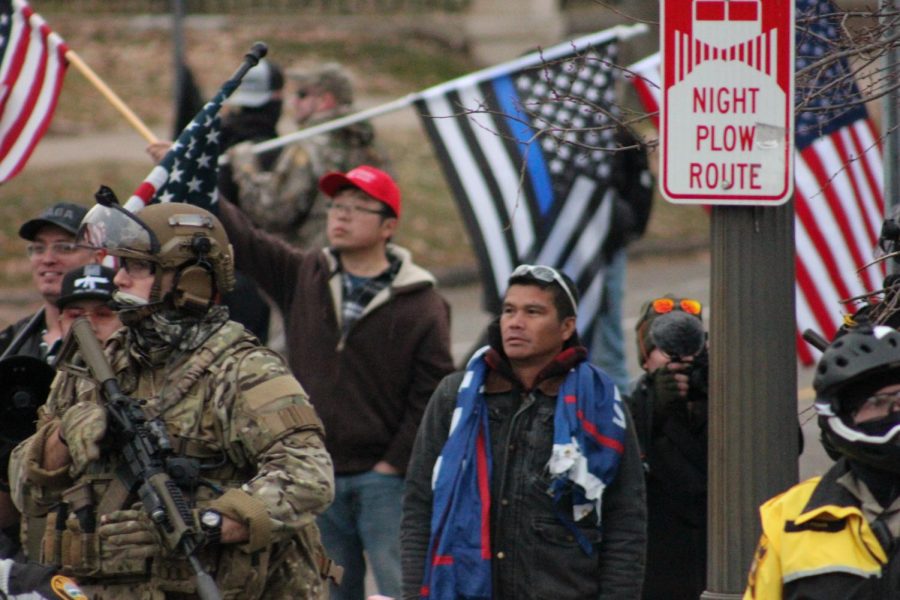 In total, there were about fifty Trump supporters and Proud Boys, waving MAGA and Blue Lives Matter flags. Very few wore masks as they were protesting the recent dial-back Covid restrictions.
