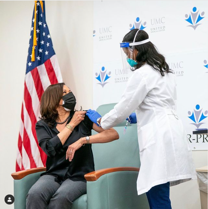 Vice-president+elect+Kamala+Harris+receives+the+first+dose+of+the+COVID-19+vaccine+in+front+of+press.