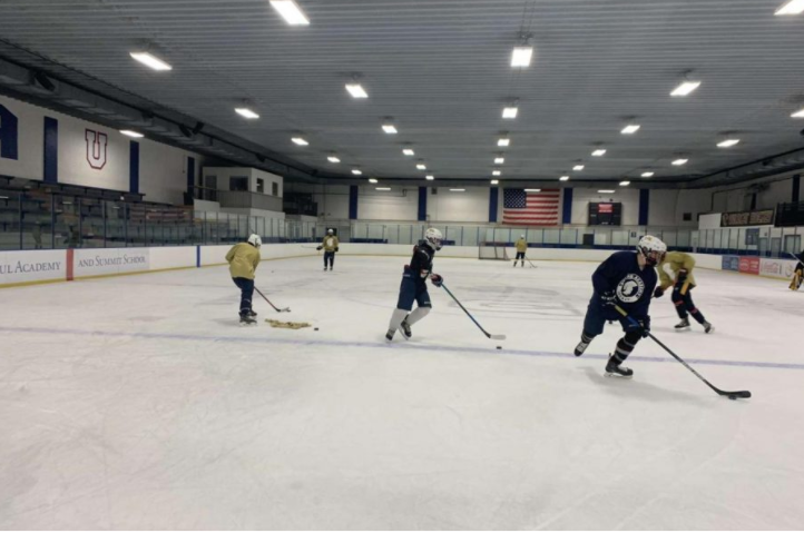 Seniors Michael Bagnoli, Evan Thissen, Frank Tsiouvaras, and Bobby Verhey participate in a drill while wearing masks.