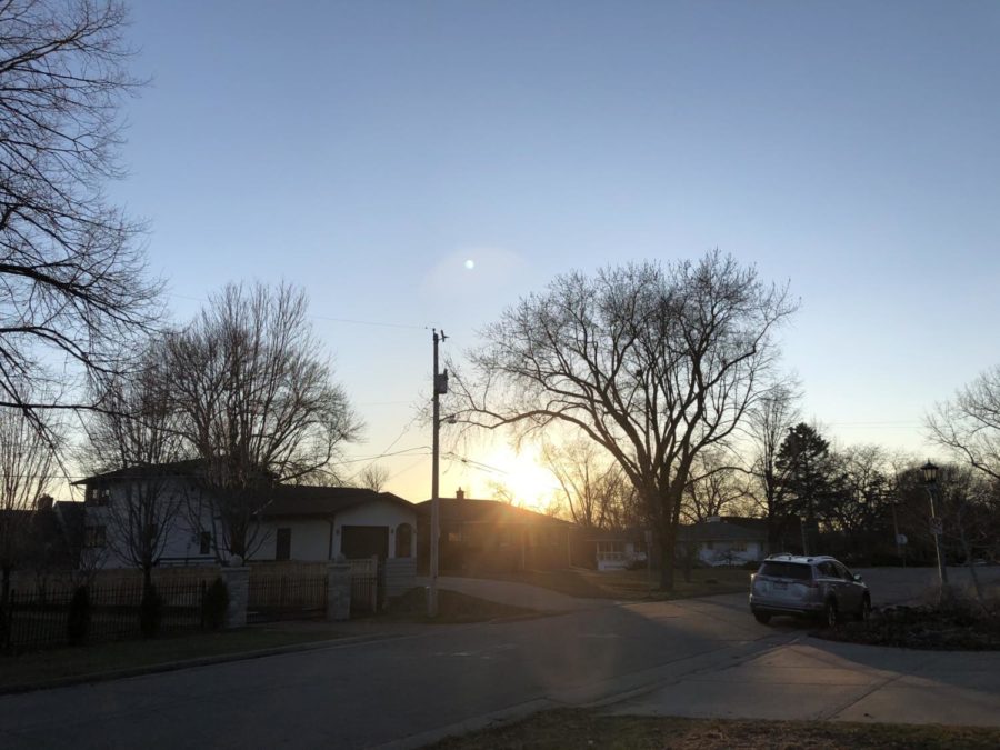 Shadows start to cover the street.